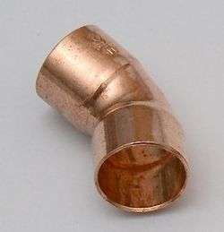 Short, 45-degree copper elbow