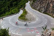 A mountain road switching back on itself.