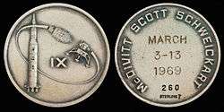  Apollo 9 mission emblem (front). Crew names, flight dates, and serial number 260 (back)