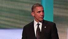 Barack Obama giving a speech to the Clinton Global Initiative in 2012