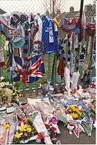 Tokens of remembrance left by Millwall fans at Upton Park for West Ham player Bobby Moore after his death