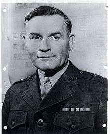 A black and white image of Charles Barrett, a white male in his Marine Corps dress uniform