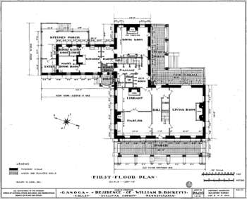 Black and white architectural diagram of an L-shaped building and a wing at top left.