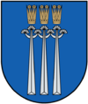 A coat of arms depicting three golden crowns with five spikes protruding from their tops all on a blue background