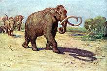 Painting of a family of mammoths walking