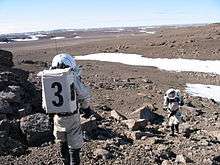 Charles Frankel and Brent Bos of Crew 3 climb Marine Rock on July 20, 2001.