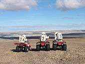 Crew 7 members on a motorized EVA.