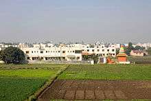 farms in Abhona Abhona. Image is taken from another hill.