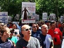 New Yorkers protest a June 2011 plan to close FDNY fire companies