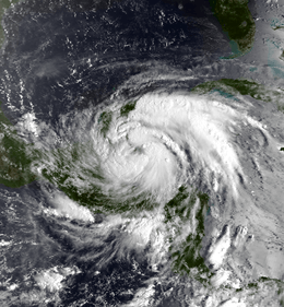 A picture of a tropical storm, it looks like a large area of clouds