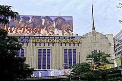 An outside view of a building with the word "BOSTON GARDEN" in front of it.