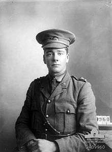 Monochrome photograph of a young World War I soldier in uniform