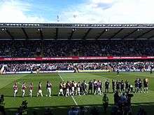  Millwall and West Ham players before kick-off in a game in August 2009