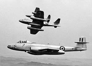 Three twin-jet military aircraft in flight