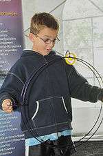 A student checks out Argonne's Gyro Wheel at the Open House.