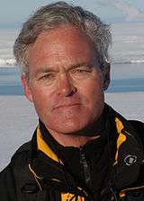 Man wearing coat in Antarctica