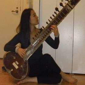 Playing Indian Sitar, TeRra Han