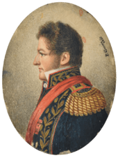 "Half length painted portrait of a man with curly auburn hair and sideburns facing left and wearing an elaborate military tunic embroidered in gold with heavy epaulettes, high embroidered collar and a red sash."