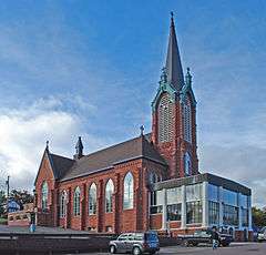 Sandstone church building.