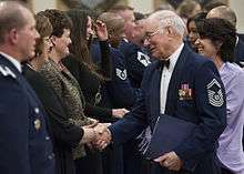 On Feb. 22, 2013, CMSAF Sam Parish congratulates Civilian Supervisor of the Year Category 2 Award Winner Annette Terry at Malmstron Air Force Base.