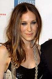 Sarah Jessica Parker in black dress and flashy diamond necklace