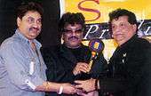 Kumar Sanu with other Thakur Doultani and Shravan