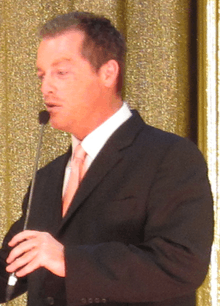 Photo of Todd Newton hosting the live-on-stage edition of the Price is Right at the Jubilee theater in Las Vegas, 2010.