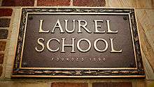 photograph of plaque affixed to Laurel School's Lyman Campus building