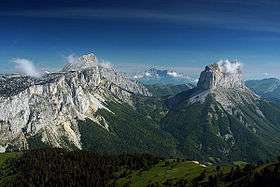 The crest of the Vercors on the left, opposing a single isolated summit