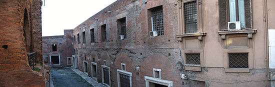 A photograph showing the view of the Trajan's Market from Via Biberatica (2006).