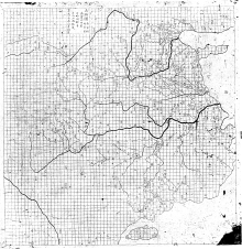 Inverted image of a stone rubbing, comprising a map of eastern China, complete with detailed rivers. The area of the map covered by land features a near perfect grid pattern, which because it does not overlap any text, is clearly the work of the original mapmaker.