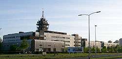 Large, low gray building housing Croatian Radiotelevision headquarters in Zagreb